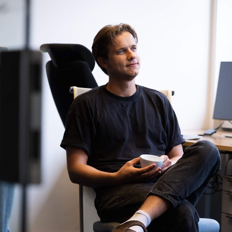 Fabian sitting in chair